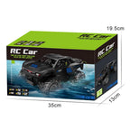 Zwarte 1:16 RC monster truck voor land en water met 4WD en grote banden