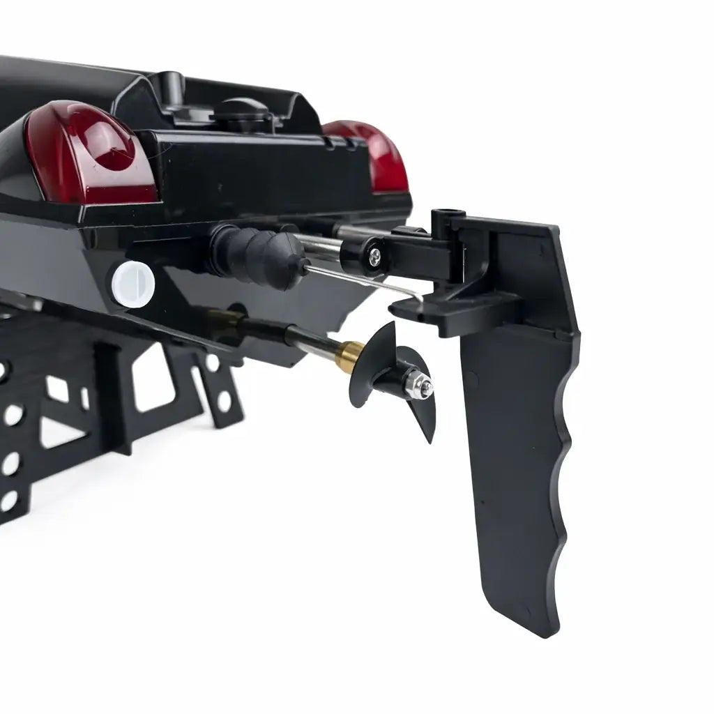 Rode en zwarte RC speedboot met afstandsbediening en originele doos