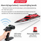 Rode en zwarte RC speedboot met afstandsbediening en originele doos