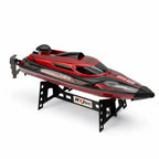 Rode en zwarte RC speedboot met afstandsbediening en originele doos